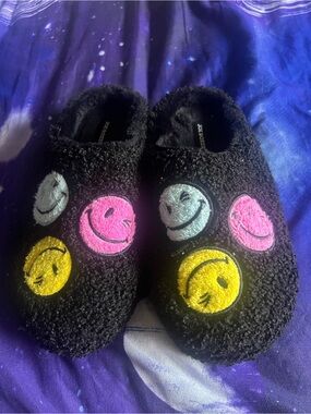Joe Boxer Black Fuzzy Slippers with Pink, Yellow, and Light Blue Smiley Faces